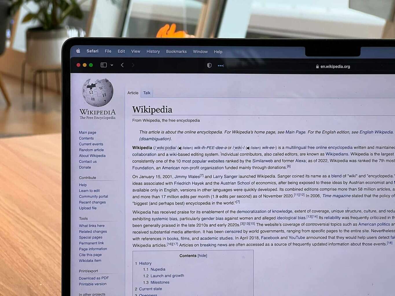 Laptop screen open to the Wikipedia homepage